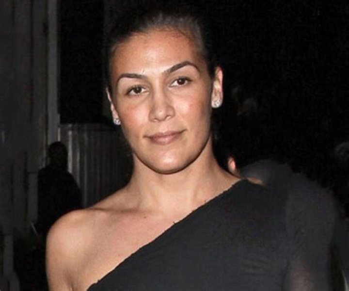 What does Nicole Young do for a living? Who was Dr Dre first wife? How much does Dre pay his ex-wife?